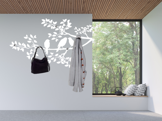 Preview: Ast mit Vögeln als dekorative Wandgarderobe im Hausgang
