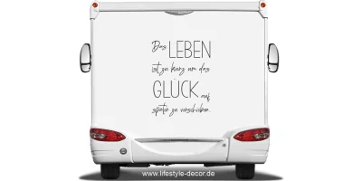 Wohnmobil Aufkleber Glück auf hellem Heck eines Wohnmobils